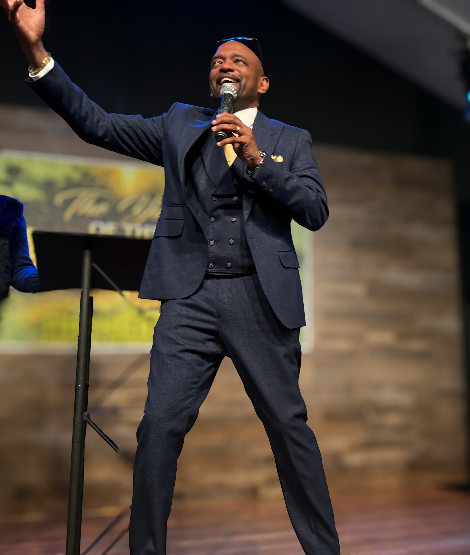 A speaker addressing the congregation at Fresh Start Worship Center